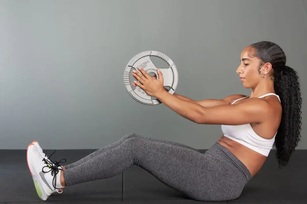 The 5 Best Weighted Core Exercises for Building Thick Abs