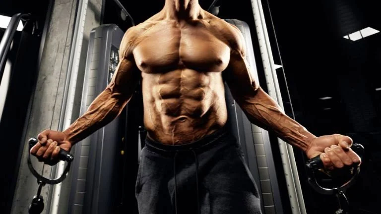 How to Perform the Low-to-High Cable Fly How to Perform the Low-to-High Cable Fly