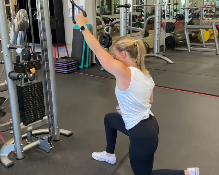 Why the Kneeling Single-Arm Cable Lat Pulldown Is So Effective Why the Kneeling Single-Arm Cable Lat Pulldown Is So Effective